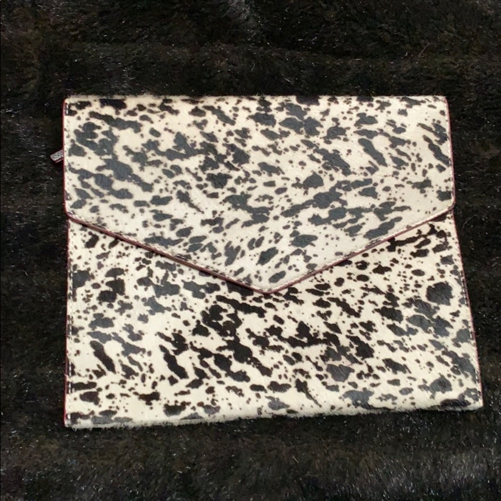 NWOT MZ WALLACE stenciled cow hide clutch